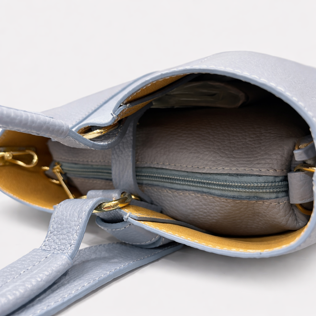 BELLA Bolso de piel azul bebé