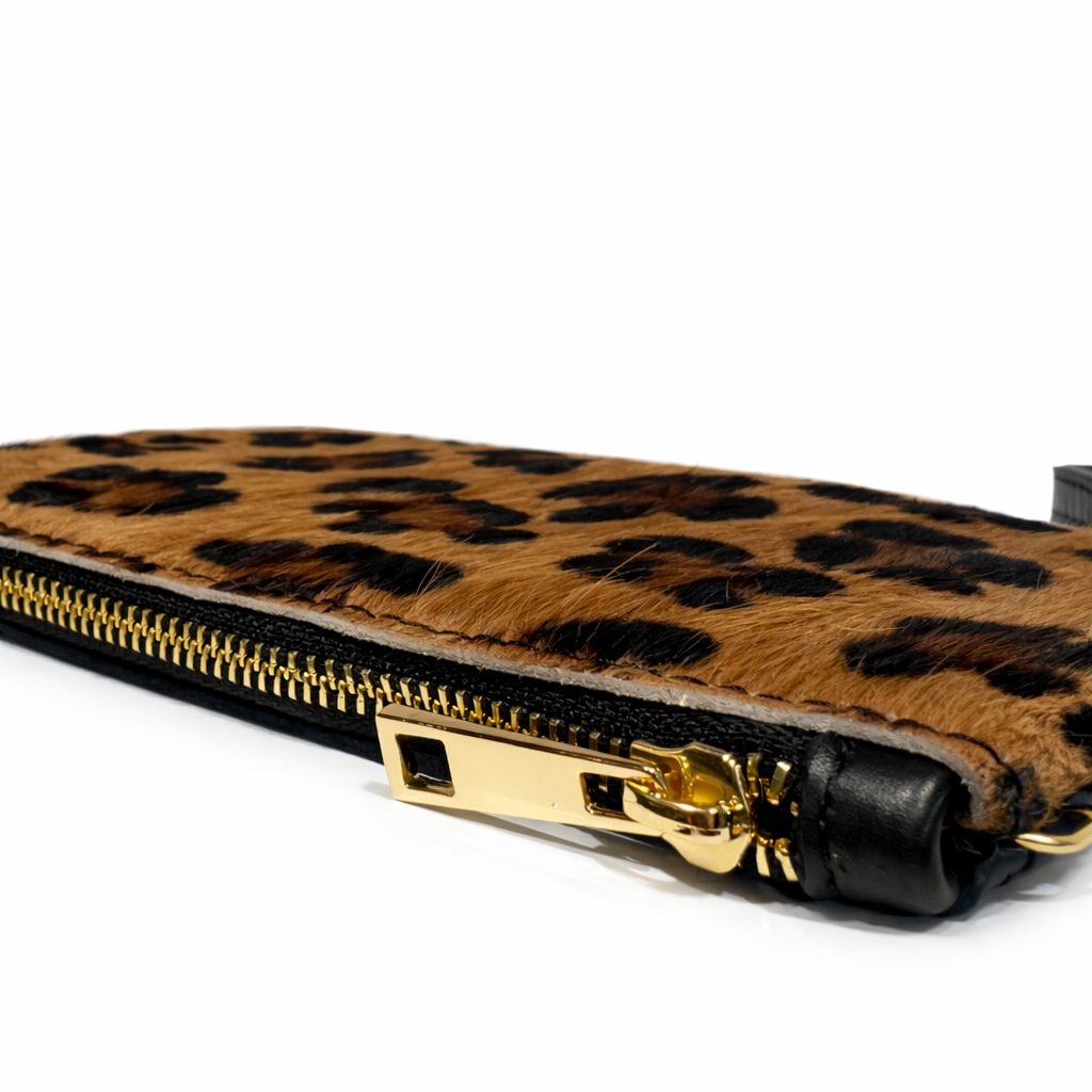 DONNA Monedero de mano en piel leopardo