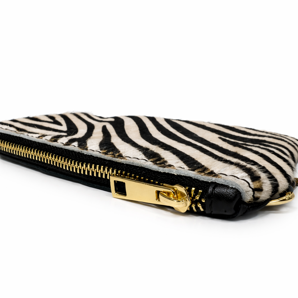 DONNA Monedero de mano en piel cebra