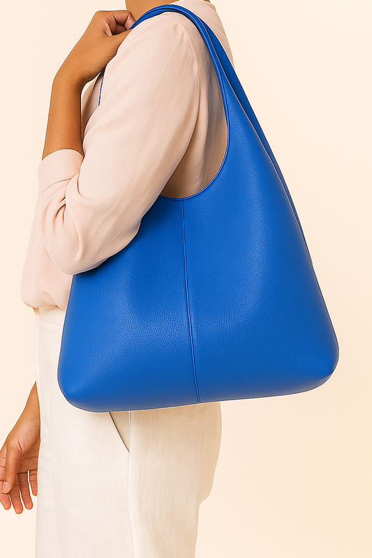 CAPRI Bolso de piel tipo saco con cremallera AZUL ELÉCTRICO